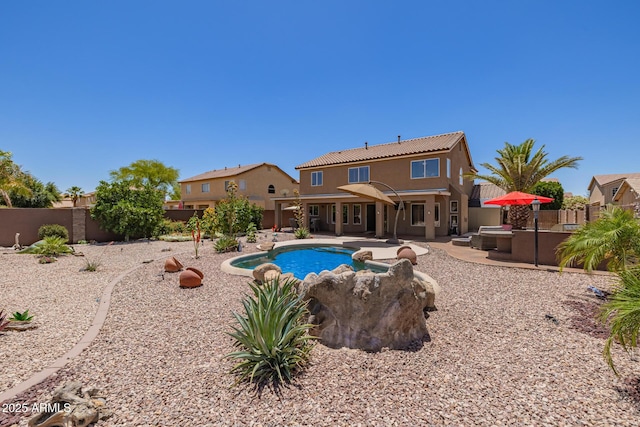 31453 N Blackfoot Dr, San Tan Valley, AZ 85143 - view of pool with a fenced backyard, a hot tub, and a patio