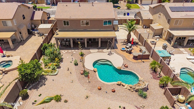 31453 N Blackfoot Dr, San Tan Valley, AZ 85143 - view of swimming pool featuring a residential view, a fenced backyard, and a patio area