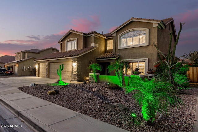 31453 N Blackfoot Dr, San Tan Valley, AZ 85143 - view of front of property featuring concrete driveway, a tiled roof, and stucco siding