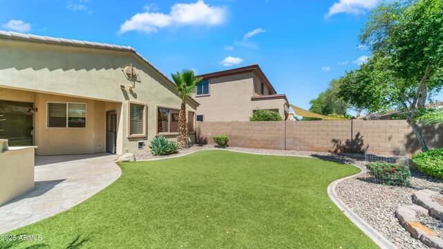 2031 W Periwinkle Way, Chandler, AZ 85248 - view of yard featuring a patio area