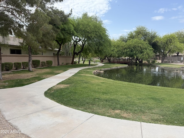 2031 W Periwinkle Way, Chandler, AZ 85248 - surrounding community with a yard and a water view