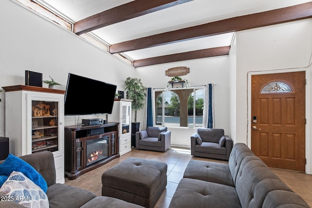 858 W Knowles Cir, Mesa, AZ 85210 - tiled living room featuring beam ceiling and a glass covered fireplace