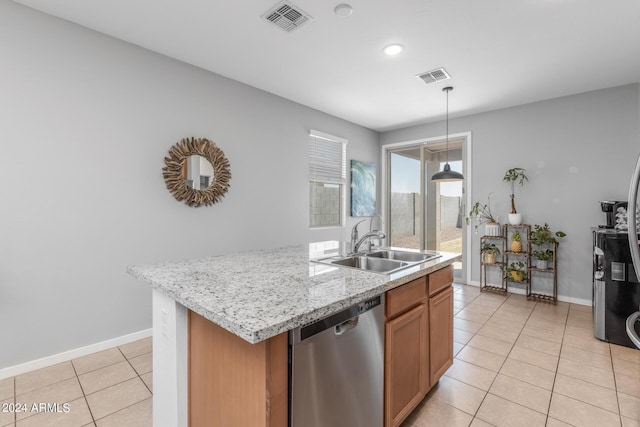 kitchen with light tile patterned flooring, visible vents, a sink, and stainless steel dishwasher