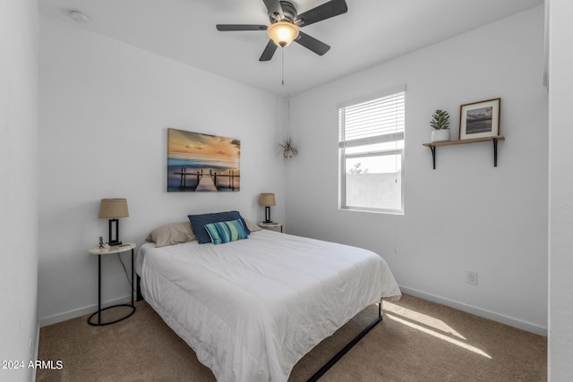 bedroom featuring carpet and ceiling fan