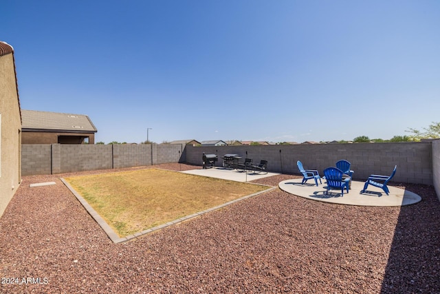 view of yard featuring a fenced backyard and a patio