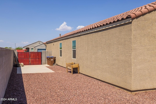 view of yard featuring a fenced backyard and a patio area