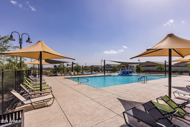 view of pool featuring a patio area