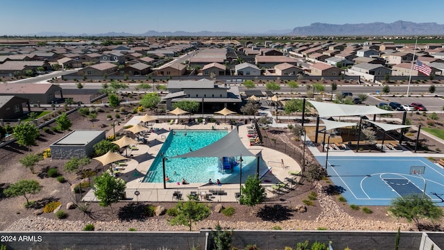 birds eye view of property featuring a mountain view