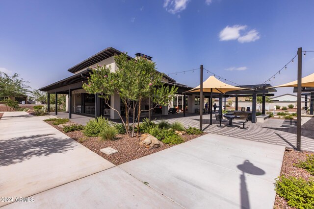 view of community with a patio