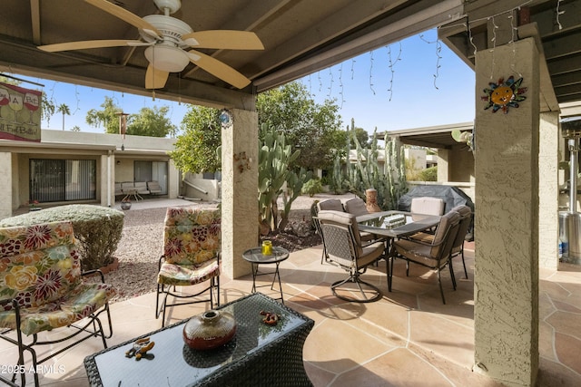 view of patio / terrace featuring ceiling fan