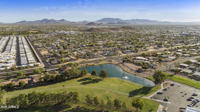 bird's eye view featuring a water and mountain view