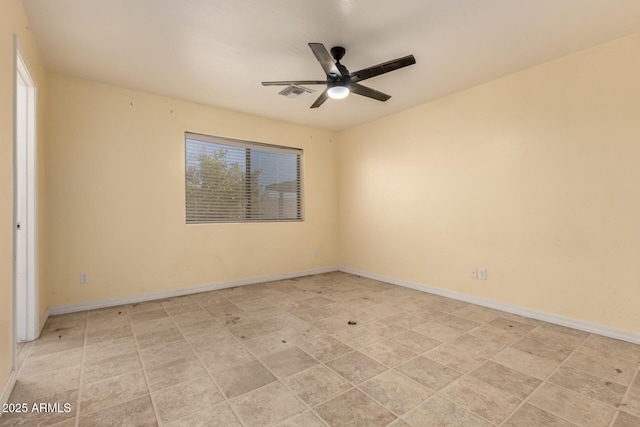 spare room featuring ceiling fan