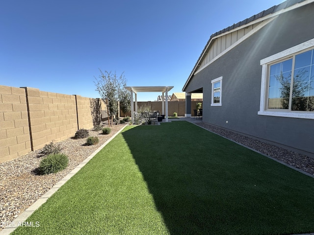 view of yard featuring a patio and a fenced backyard