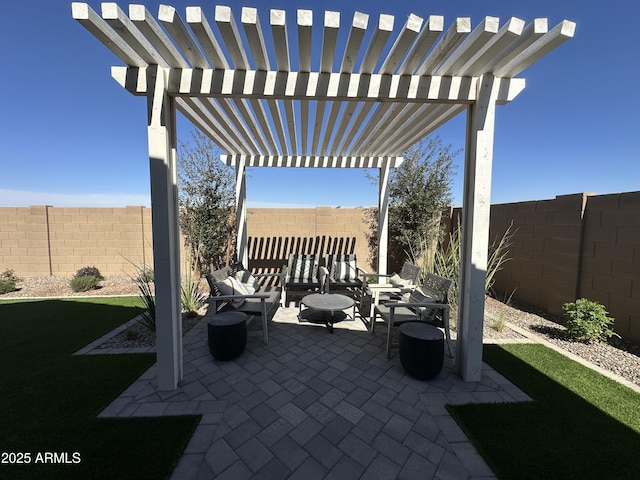 view of patio / terrace with outdoor lounge area, a fenced backyard, and a pergola