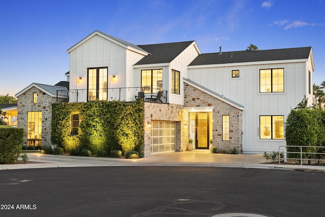 4407 N 37th Way, Phoenix, AZ 85018 - modern inspired farmhouse with stone siding, board and batten siding, and a balcony