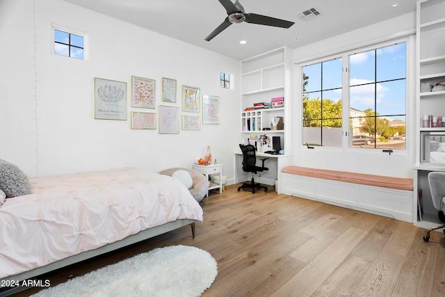 bedroom featuring light hardwood / wood-style flooring and ceiling fan