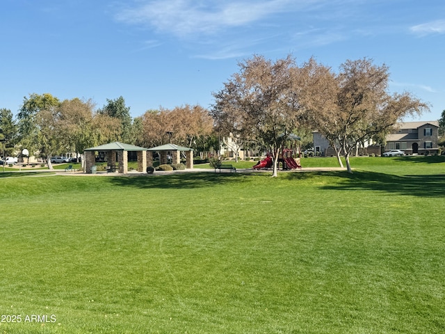 surrounding community featuring a yard, a playground, and a gazebo