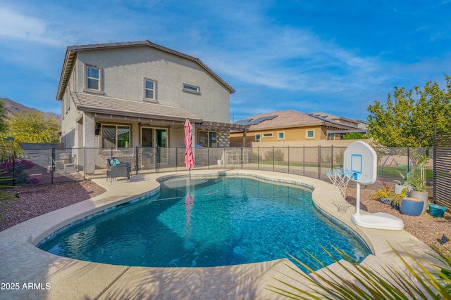 view of pool featuring a patio area and a pergola