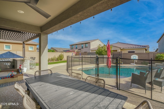 view of pool featuring a patio area and ceiling fan
