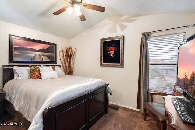 bedroom featuring ceiling fan, lofted ceiling, and dark colored carpet