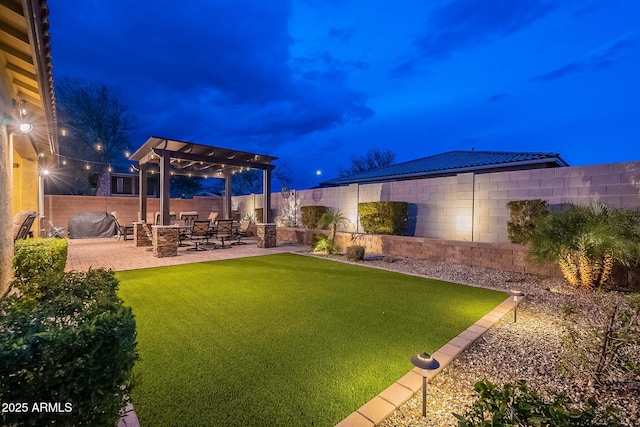 view of yard with a pergola and a patio area