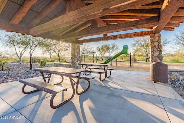 view of patio with a playground