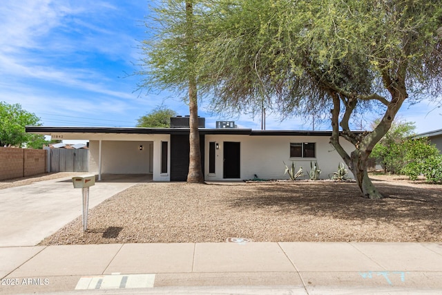 11842 N 30th Dr, Phoenix, AZ 85029 - ranch-style house featuring concrete driveway, fence, and an attached carport