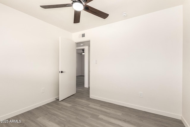 11842 N 30th Dr, Phoenix, AZ 85029 - empty room with visible vents, baseboards, wood finished floors, and ceiling fan