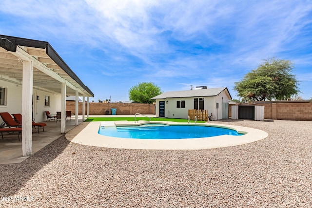 11842 N 30th Dr, Phoenix, AZ 85029 - view of swimming pool with a fenced in pool, a patio, a fenced backyard, and an outbuilding
