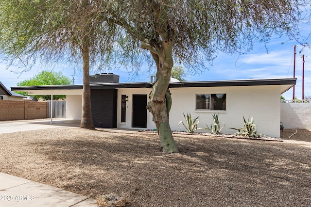 11842 N 30th Dr, Phoenix, AZ 85029 - view of front of property with an attached carport, driveway, fence, and stucco siding