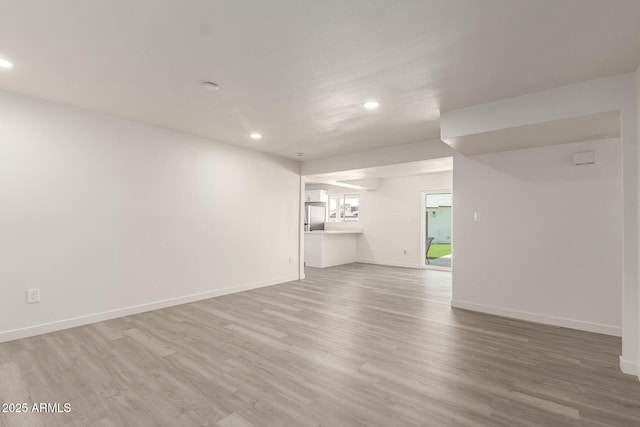 11842 N 30th Dr, Phoenix, AZ 85029 - spare room with baseboards, light wood finished floors, and recessed lighting
