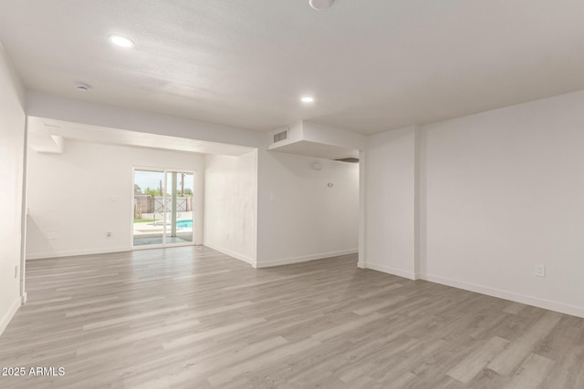 11842 N 30th Dr, Phoenix, AZ 85029 - empty room with visible vents, light wood-type flooring, and baseboards
