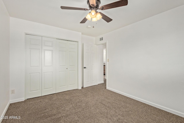 4629 S Mill Ave, Tempe, AZ 85282 - unfurnished bedroom featuring carpet floors, a closet, and a ceiling fan