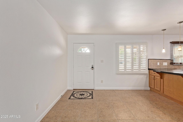 4629 S Mill Ave, Tempe, AZ 85282 - foyer entrance with plenty of natural light and light tile patterned flooring