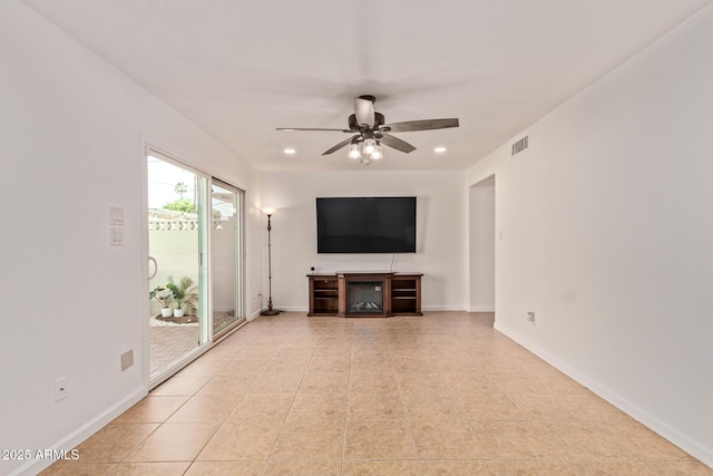 4629 S Mill Ave, Tempe, AZ 85282 - unfurnished living room with a ceiling fan, recessed lighting, and light tile patterned flooring