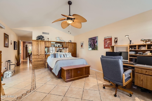bedroom with light tile patterned floors, visible vents, vaulted ceiling, and baseboards