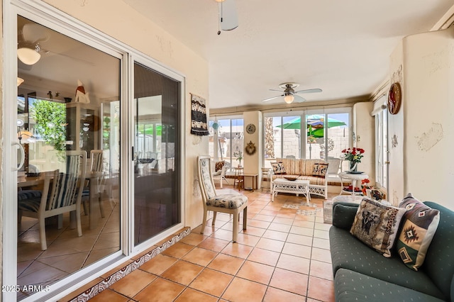 sunroom / solarium featuring tile patterned floors