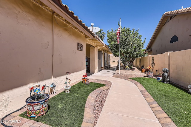 view of yard featuring a patio and a fenced backyard