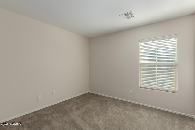 empty room featuring carpet flooring