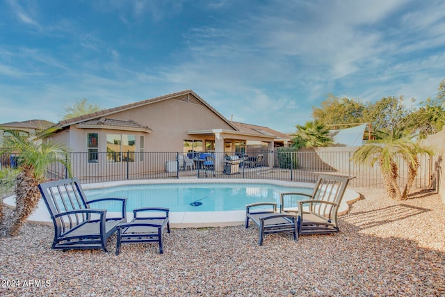 view of pool featuring a patio area