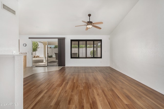 unfurnished living room featuring ceiling fan and wood-type flooring