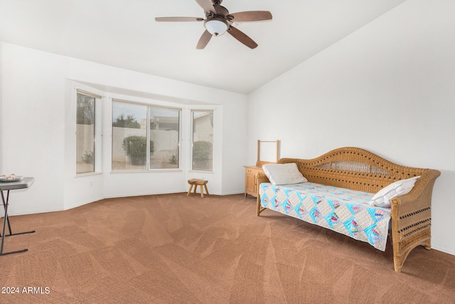 carpeted bedroom with ceiling fan and lofted ceiling