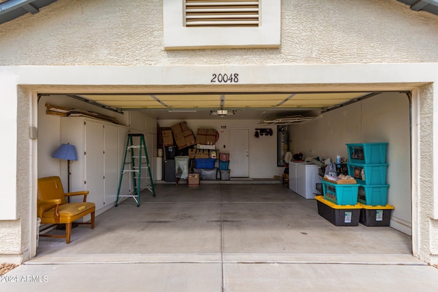 garage featuring independent washer and dryer