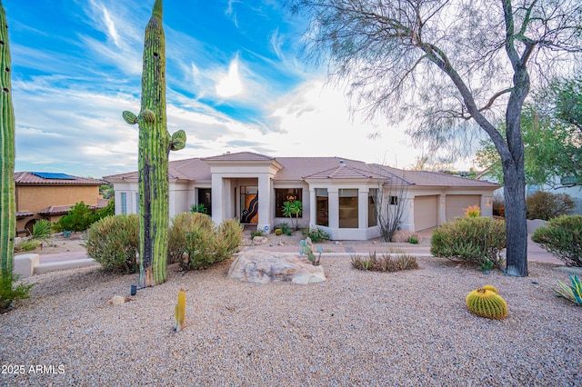 view of front of house with a garage