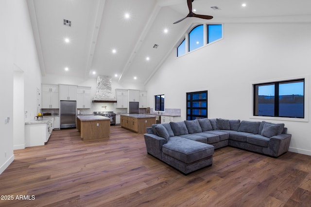 living room with visible vents, a ceiling fan, high vaulted ceiling, and dark wood-style floors