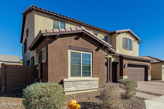 view of front of property with a garage