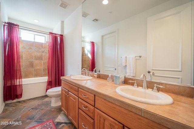 full bathroom featuring shower / tub combo with curtain, vanity, and toilet