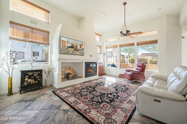 living room with a towering ceiling