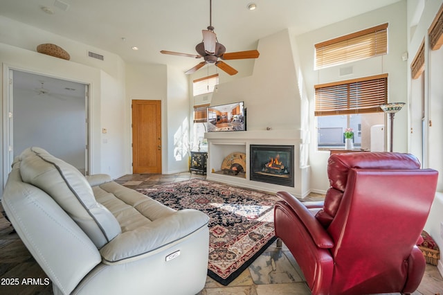 living room featuring ceiling fan