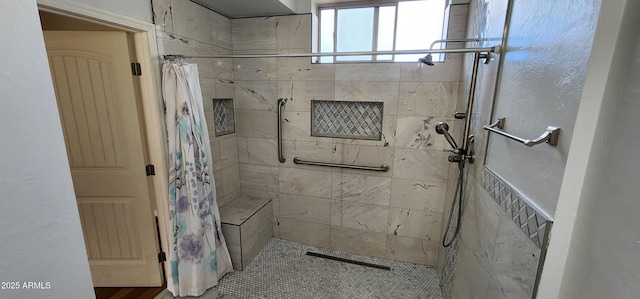 bathroom featuring a stall shower